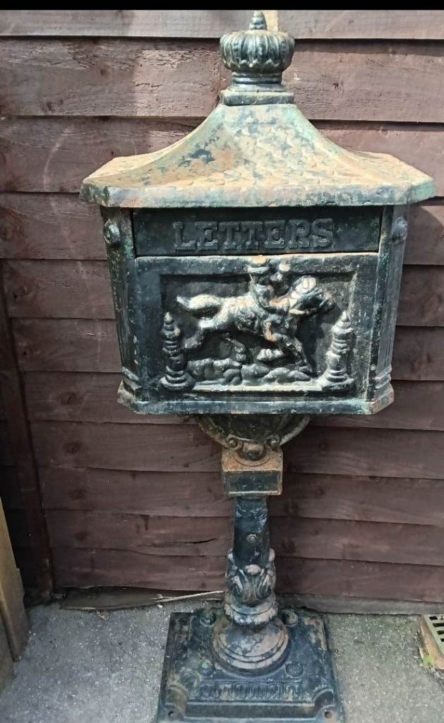 Cast iron antique pedestal post Mailbox.