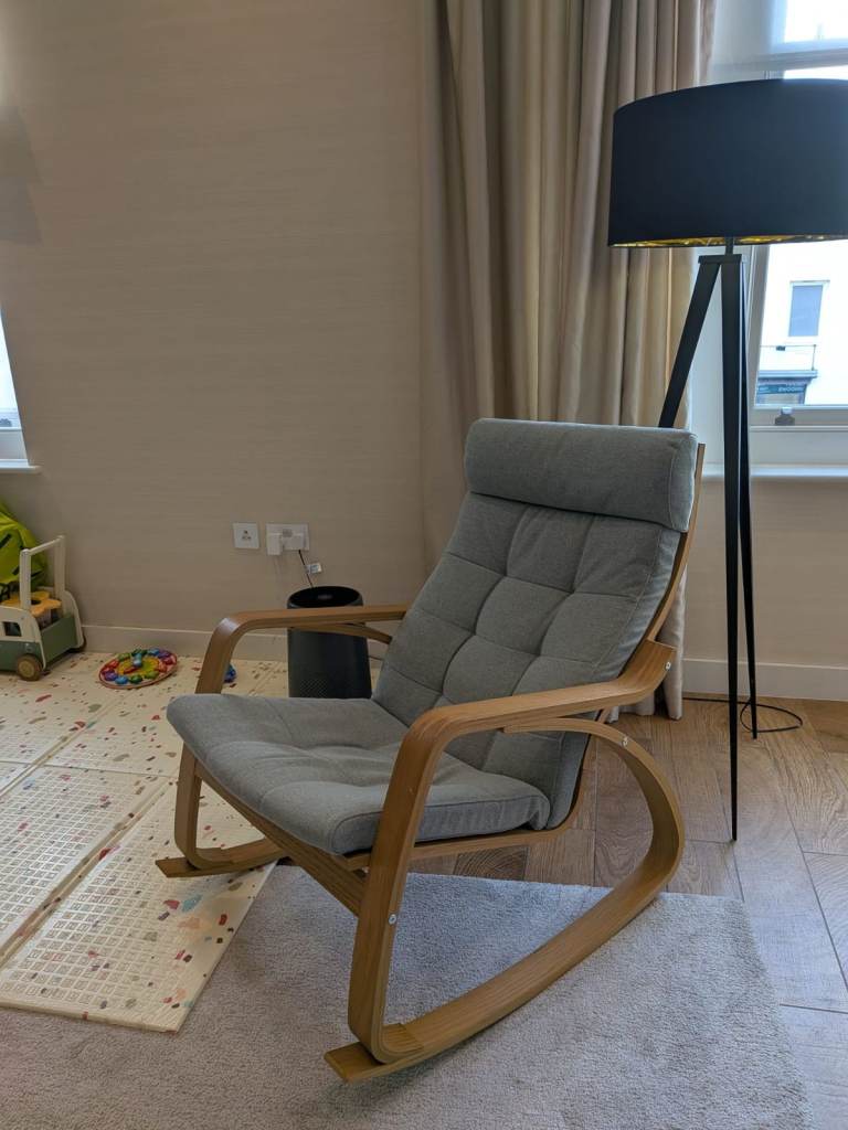 Comfy Wooden Rocking Chair with Grey Cushions – Good Condition