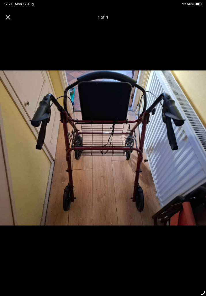 Red Mobility Walker with Seat and Basket – Good Condition