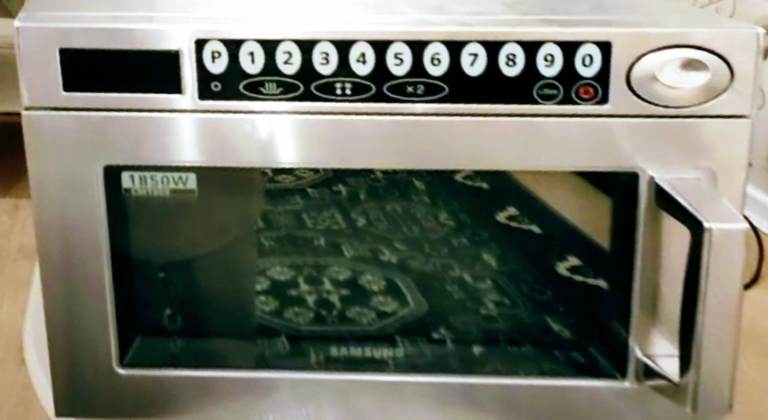 Samsung CM1929 silver microwave.