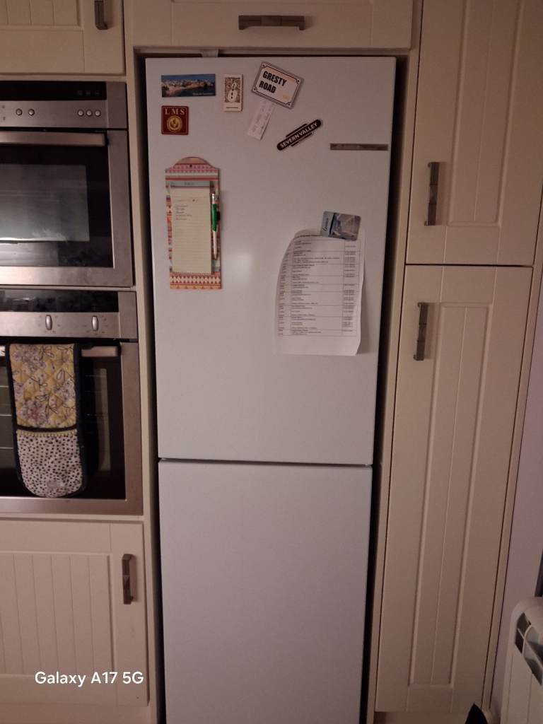 Free standing Bosch fridge freezer - still under warranty. 