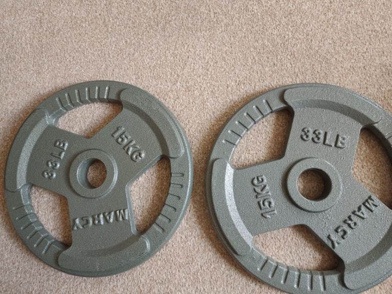 Two 15KG two inch olympic grip plates
