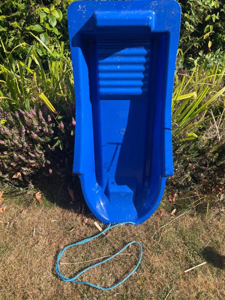 Blue Plastic Sledge with Rope – Good Condition
