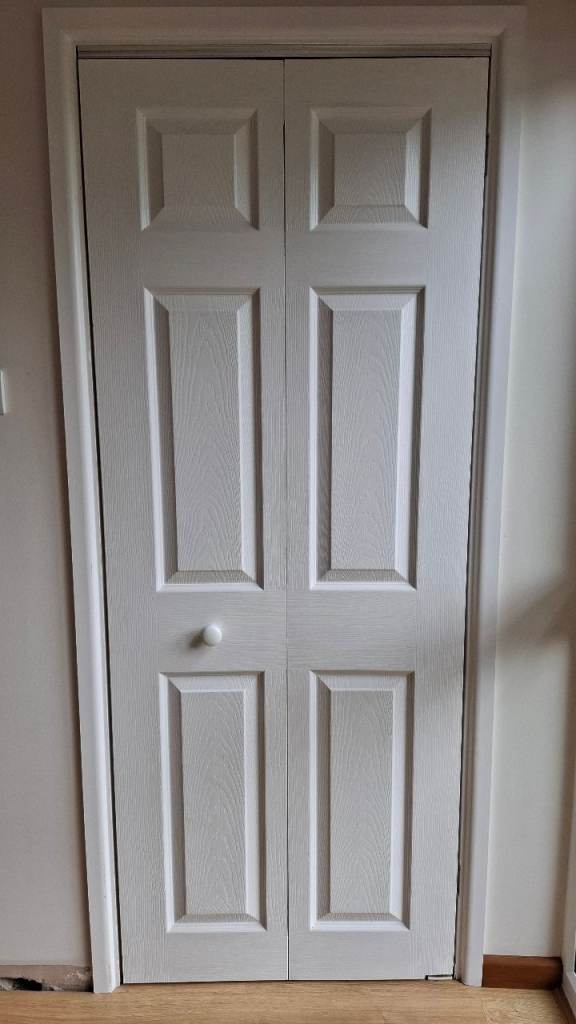 6-panel, wood grain textured, white, Bi-Fold Internal Door 