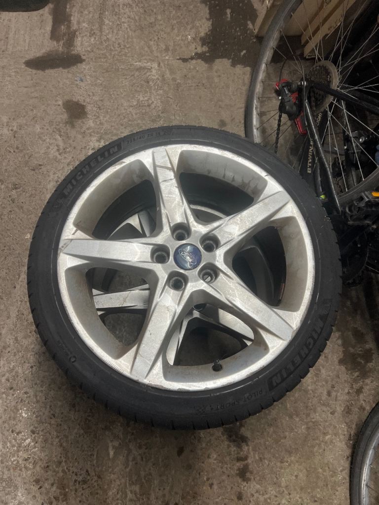 2 original Ford 18 inch wheels with tires