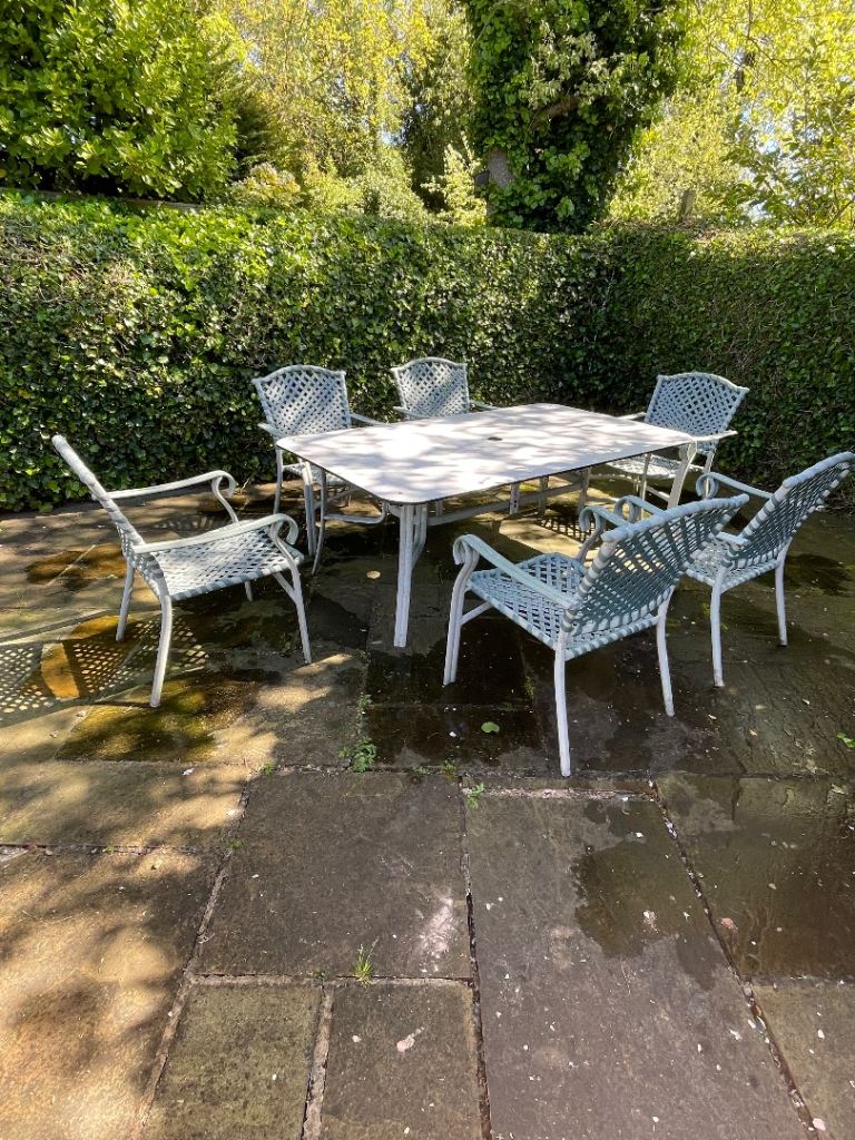 Wrought iron garden table and chairs 