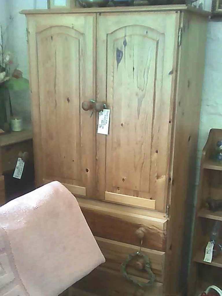 SOLID PINE COMPACTUM. TOP INNER SHELVING, COULD BE HANGING SPACE. LOWER DRAWERS. DELIVERY POSS