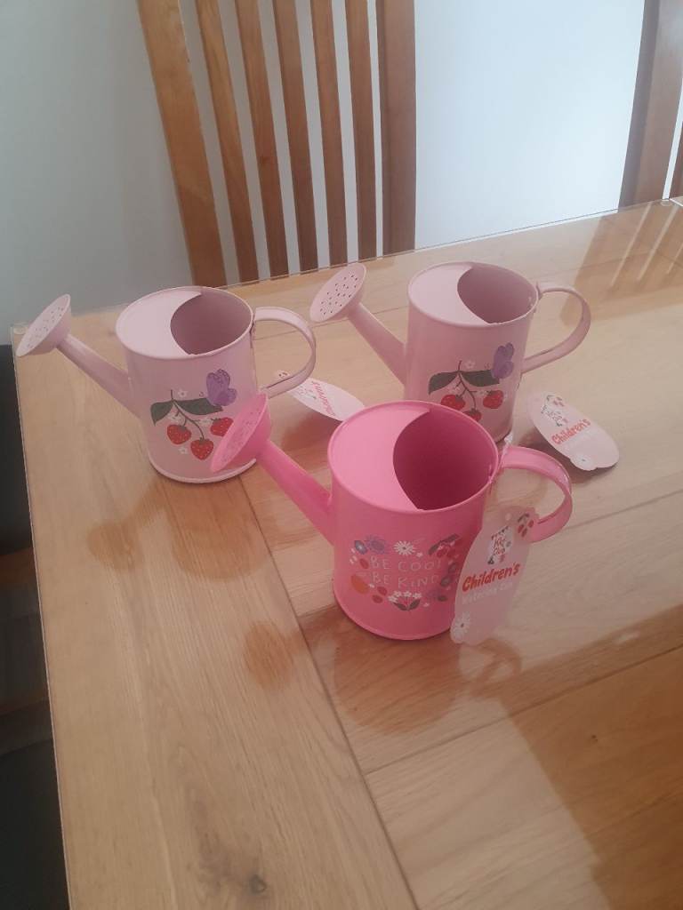 Three Brand New Children's Pink Watering Cans