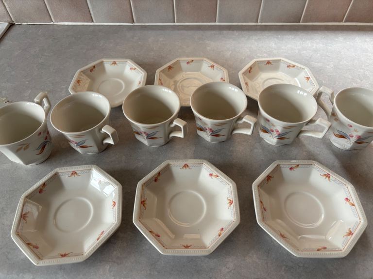 6 cups and saucers as shown 