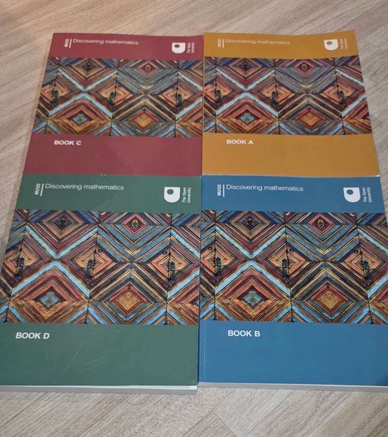 The Open University's "Discovering Mathematics" MU123 module books A, B, C, D