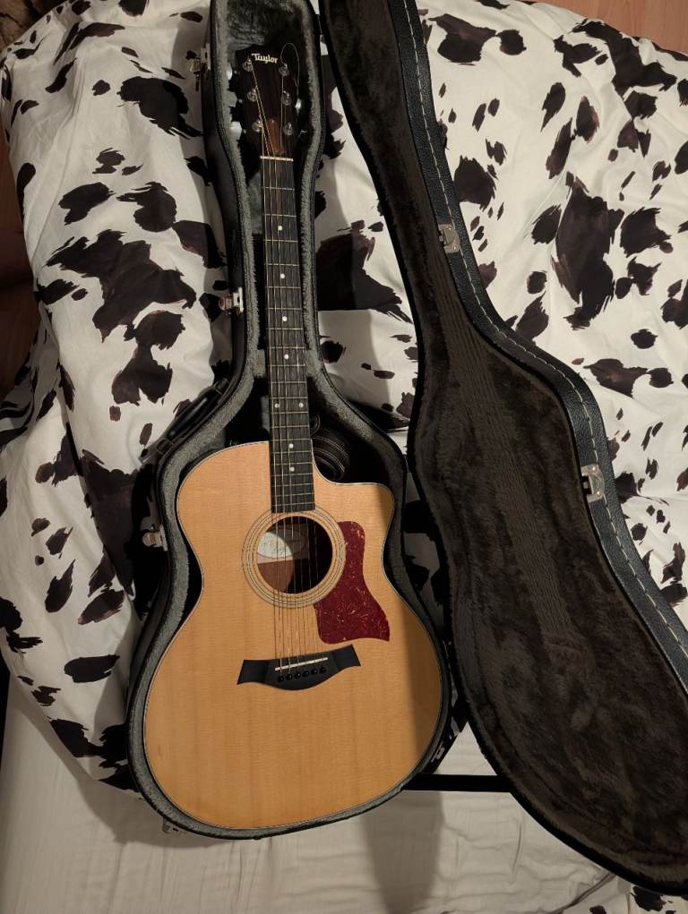 £650 ONO - Taylor 214ce Electro Acoustic Guitar with Hard Case and Leather Strap