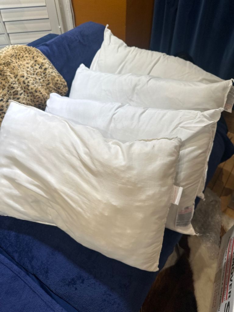 Four White Cotton Pillows – Good Condition