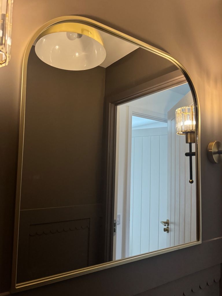 Gold arched mirror 