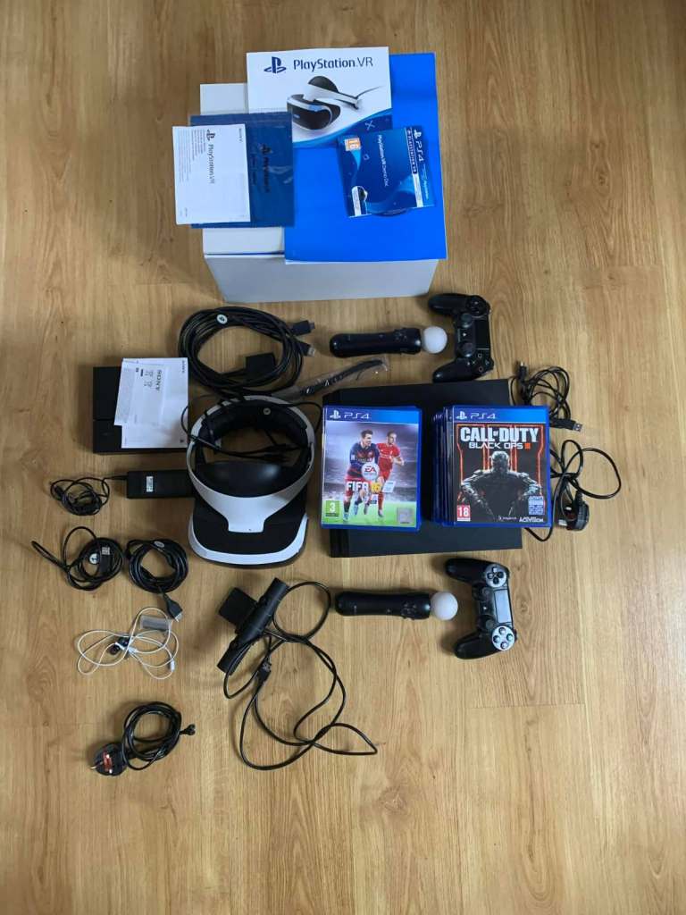 PS4 with VR Headset, Camera, 2 Dualshock Controllers, 2 Move Controllers and 21 Games
