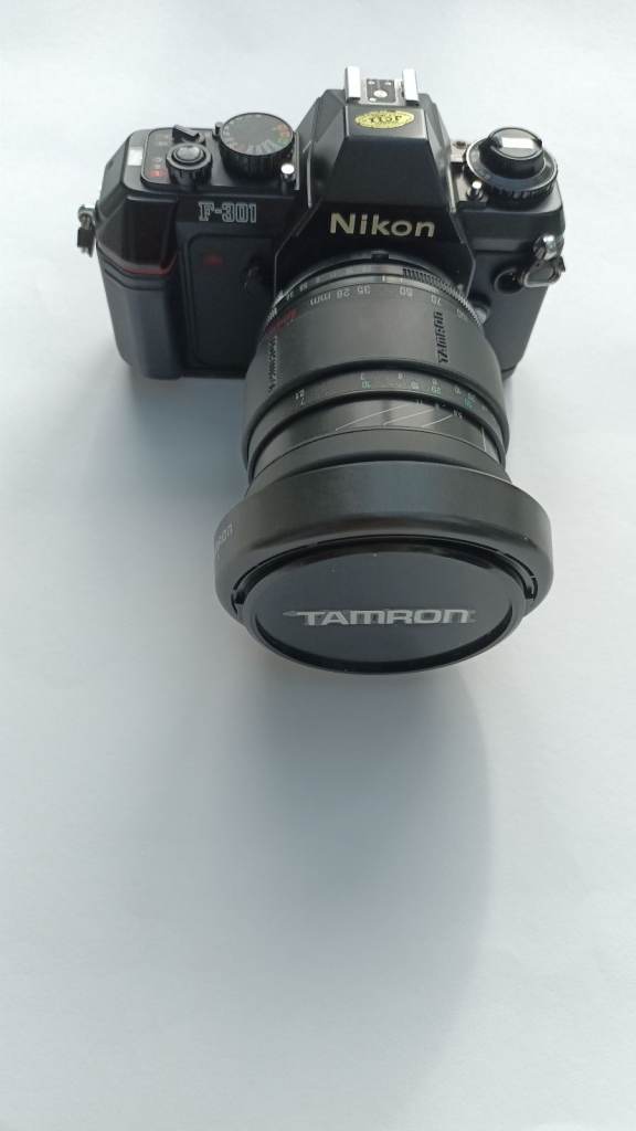 Nikon F301 SLR film camera with Tamron 28 - 200 zoom lens and flash lens28 - 200 zoom and Flash