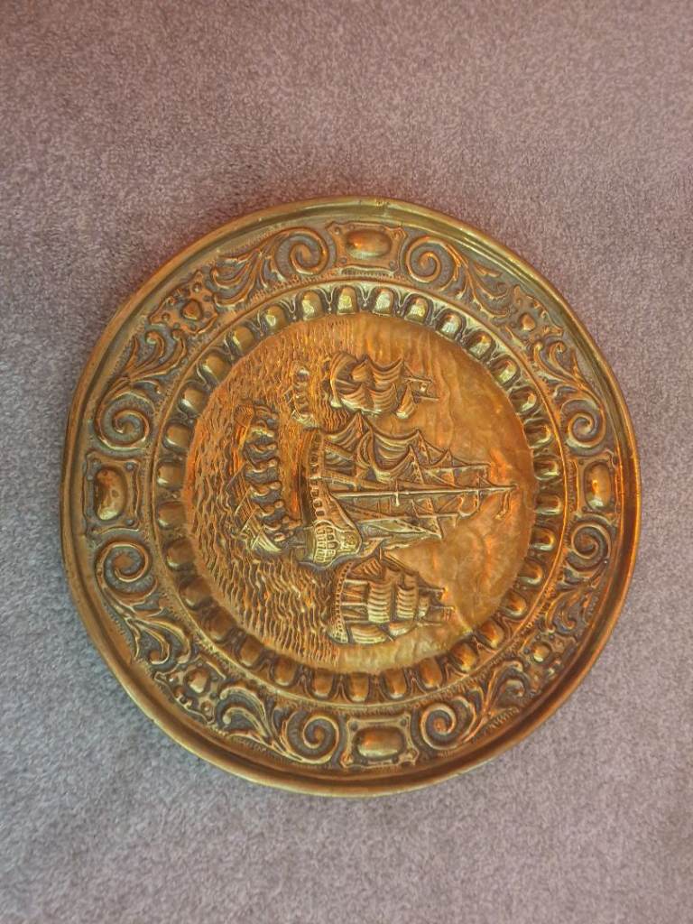 Vintage brass embossed wall plaque 