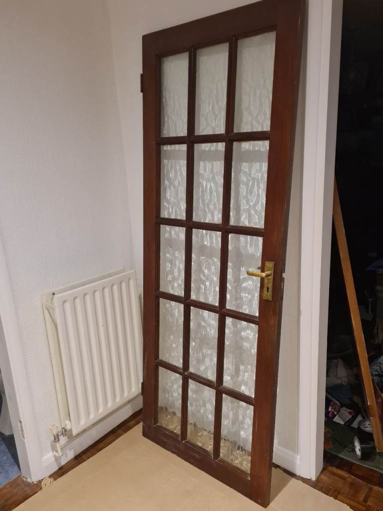 4 Wooden internal doors with glass panels. Nominally 78" x 30" 