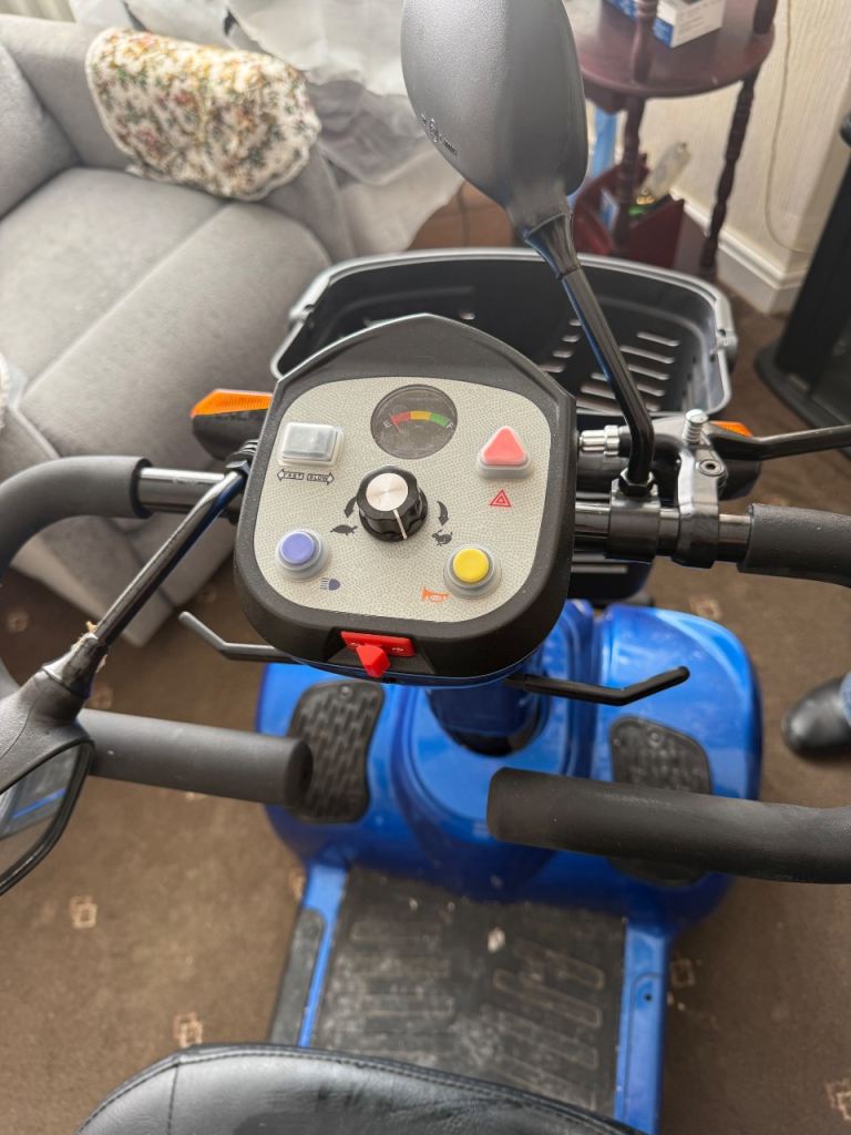 Practically brand new mobility scooter and new ramp 