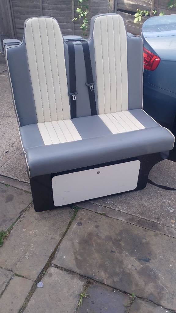 Rock and Roll bed with seatbelts for campervan conversion 