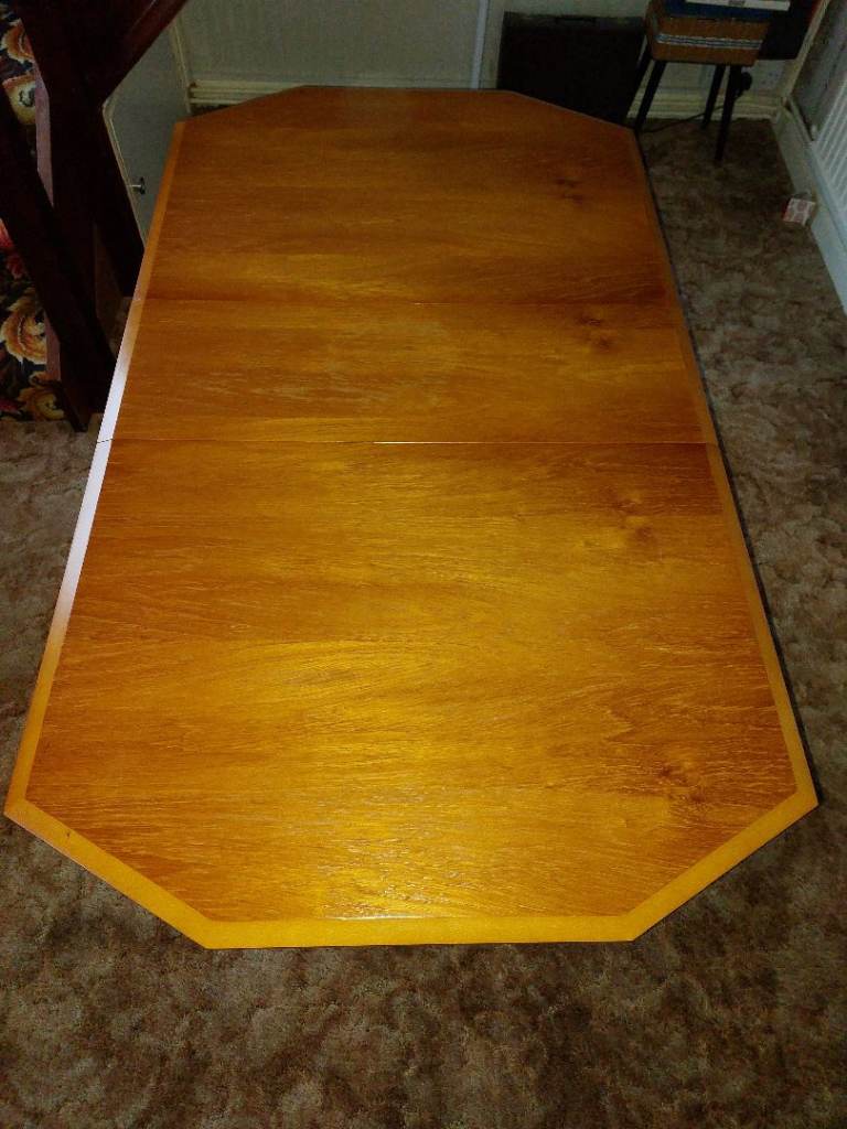 Teak dining table