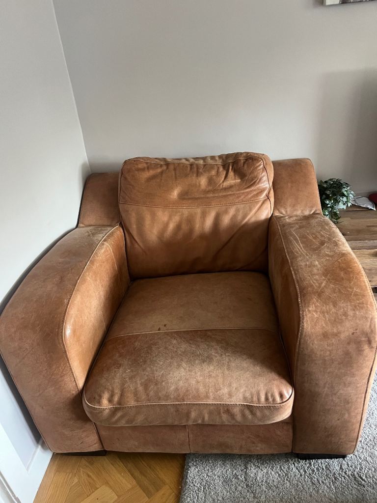 Tan leather arm chair