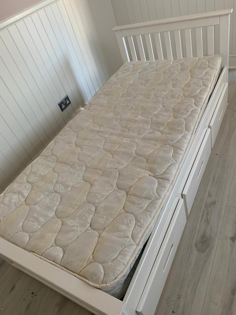 Single white bed frame with draws