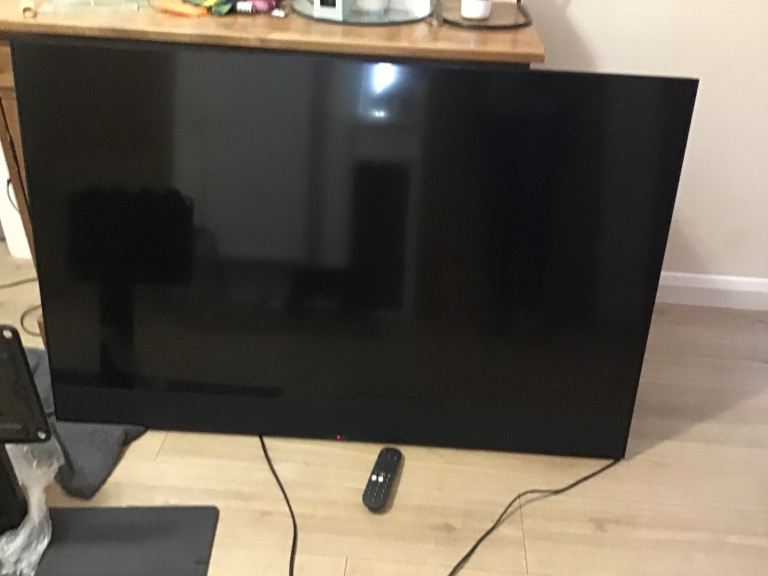 Sky Glass 55” TV with integrated soundbar.  With stand and remote control.