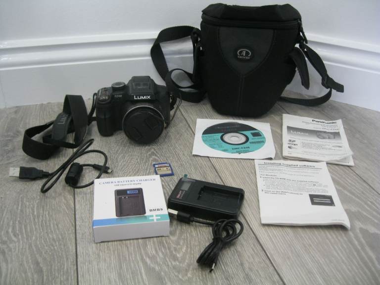 Panasonic Lumix DMC-FZ48 Digital Camera 12.1 MP 24x Optical Zoom & Charger/Bag