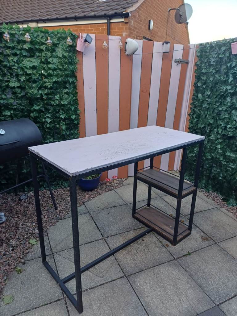 High table with side shelves
