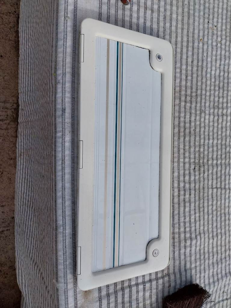 Caravan side locker door and frame 