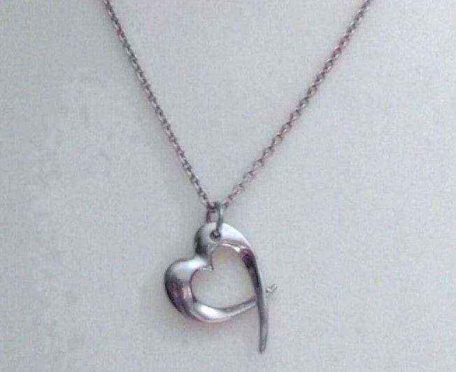 New Silver Toned Necklace with Heart Pendant.POST OR COLLECT!