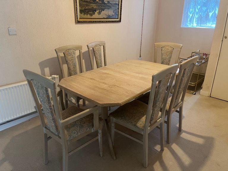 Six seater wood table and chairs