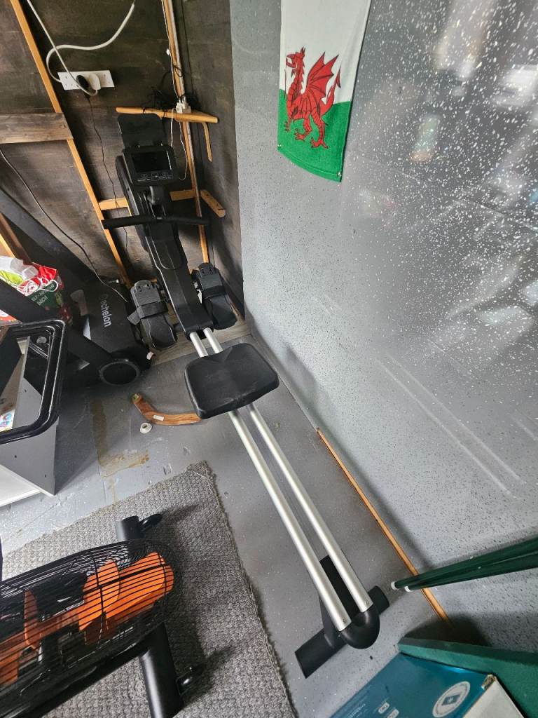 Rowing Machine - Black and Silver, Good Condition