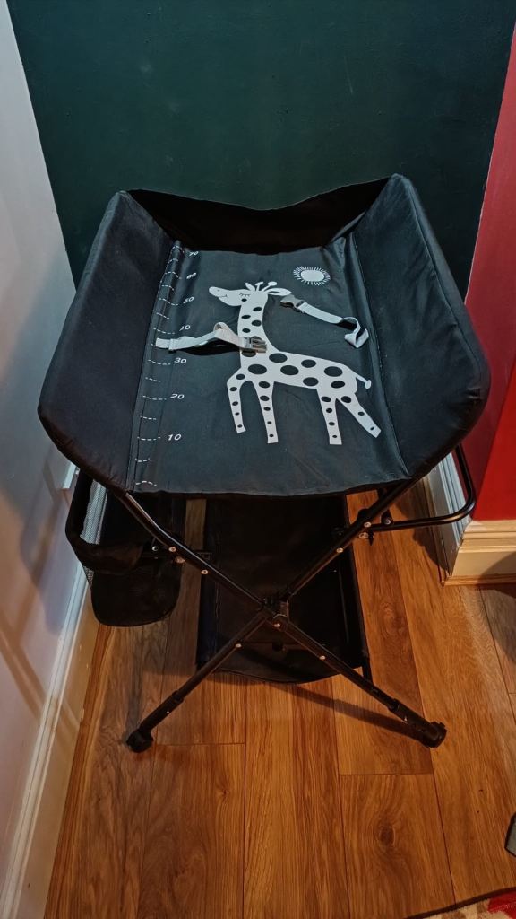 Baby Changing Table with Giraffe Design – Black, Good Condition