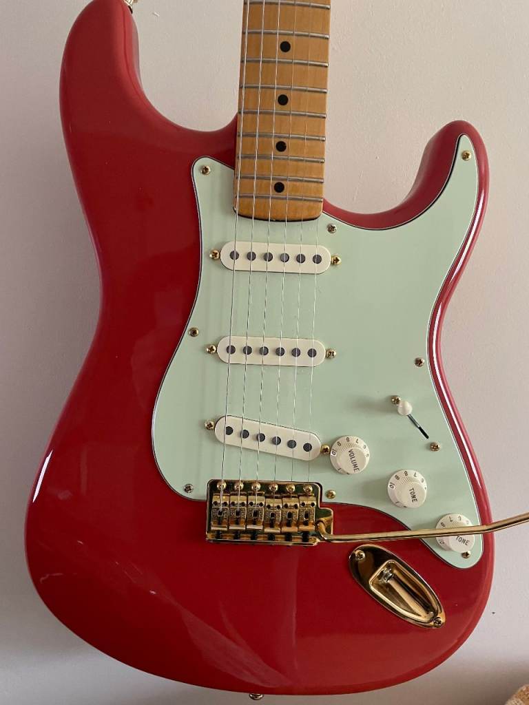 Fender Stratocaster with upgraded Fender gold hardware   