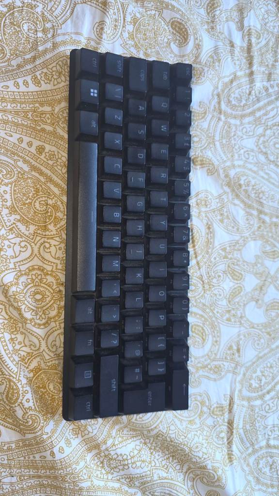 Razer mechanical keyboard.  Perfect condition.  Comes with yhe original cable. 