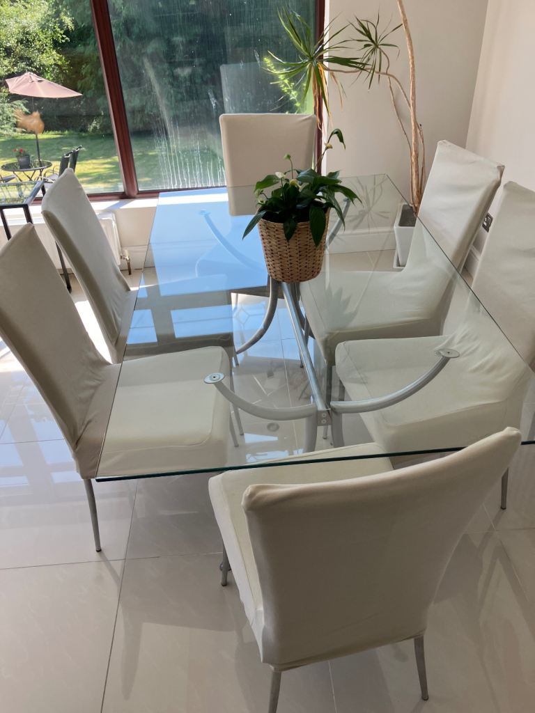 Glass Dining Table with 6 Chairs – Good Condition
