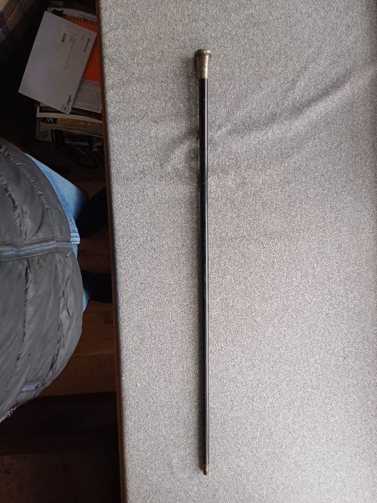 Silver topped antique walking cane.