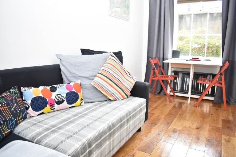 This 1 bedroom flat includes a double bed, wardrobe and storage