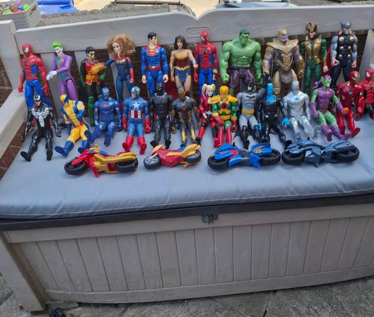 Large Collection of Superhero Action Figures with Motorbikes