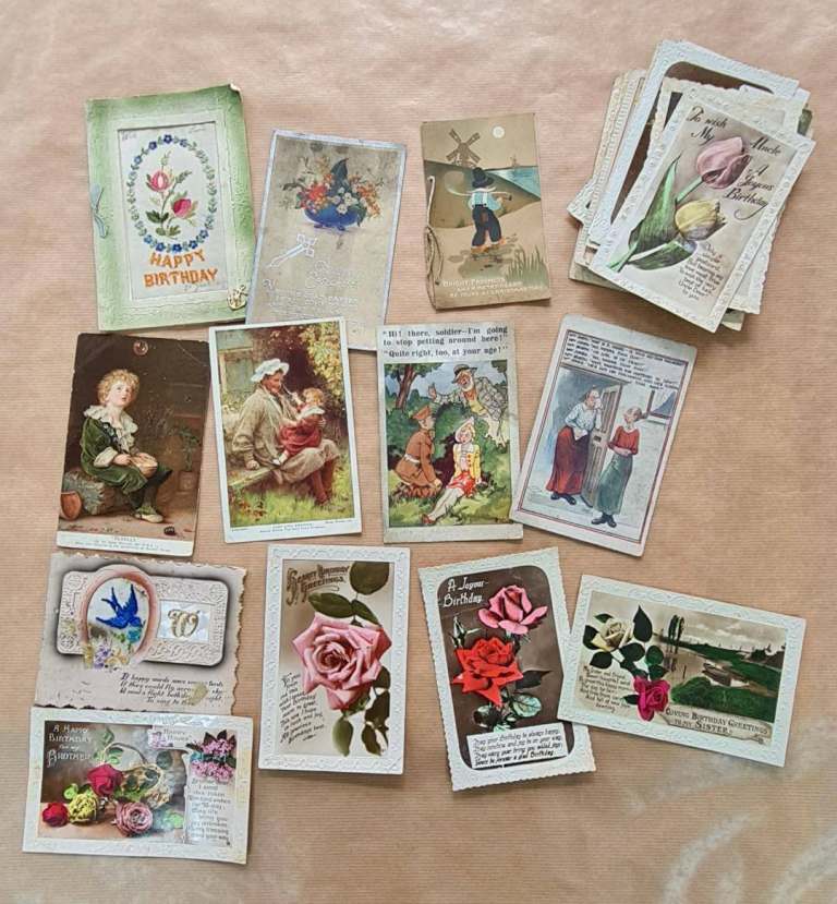 33 mixed greeting cards from 1900 - 1920s, some used some not.