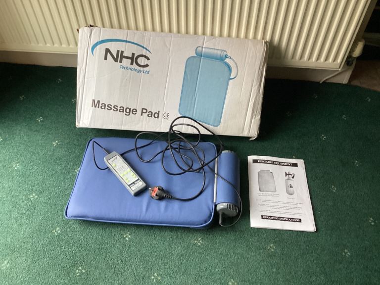Massage pad and hand held one together.