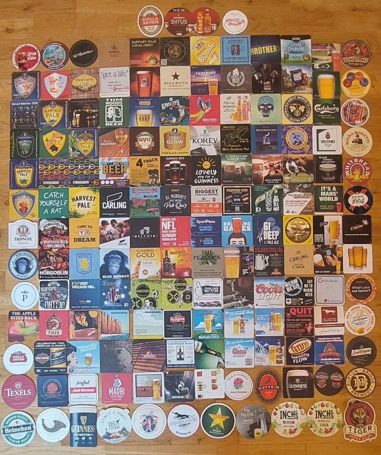 Interesting collection of 158 beer mats from the UK & abroad in mint condition