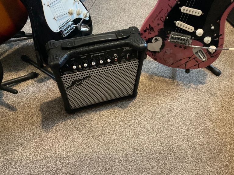 Jaxville Pink Punk electric guitar with amplifier 