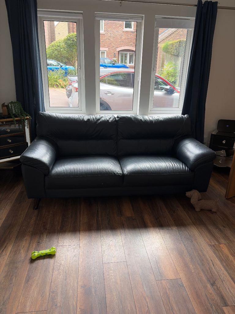 Blue Leather 2-Seater Sofa – Good Condition