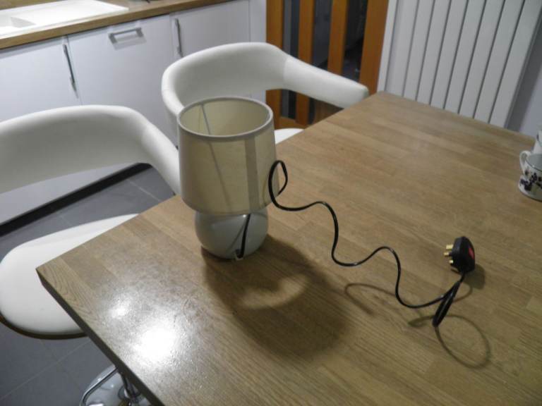 Small touch activated bedside lamp