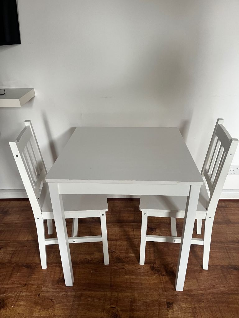 White breakfast table with 2 chairs