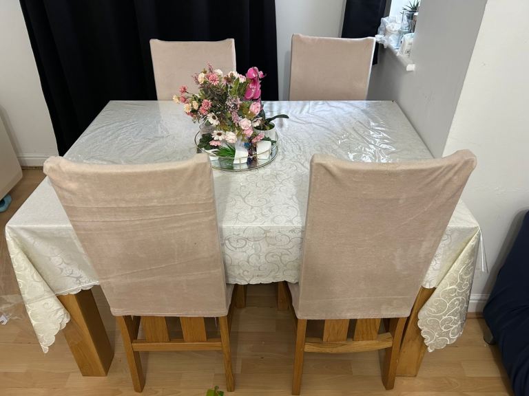 Good Condition Brown Wooden Dining Table with 4 Chairs