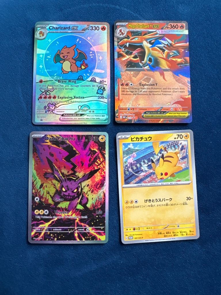 Set of 4 Pokémon Trading Cards - Charizard, Pikachu, Darkrai