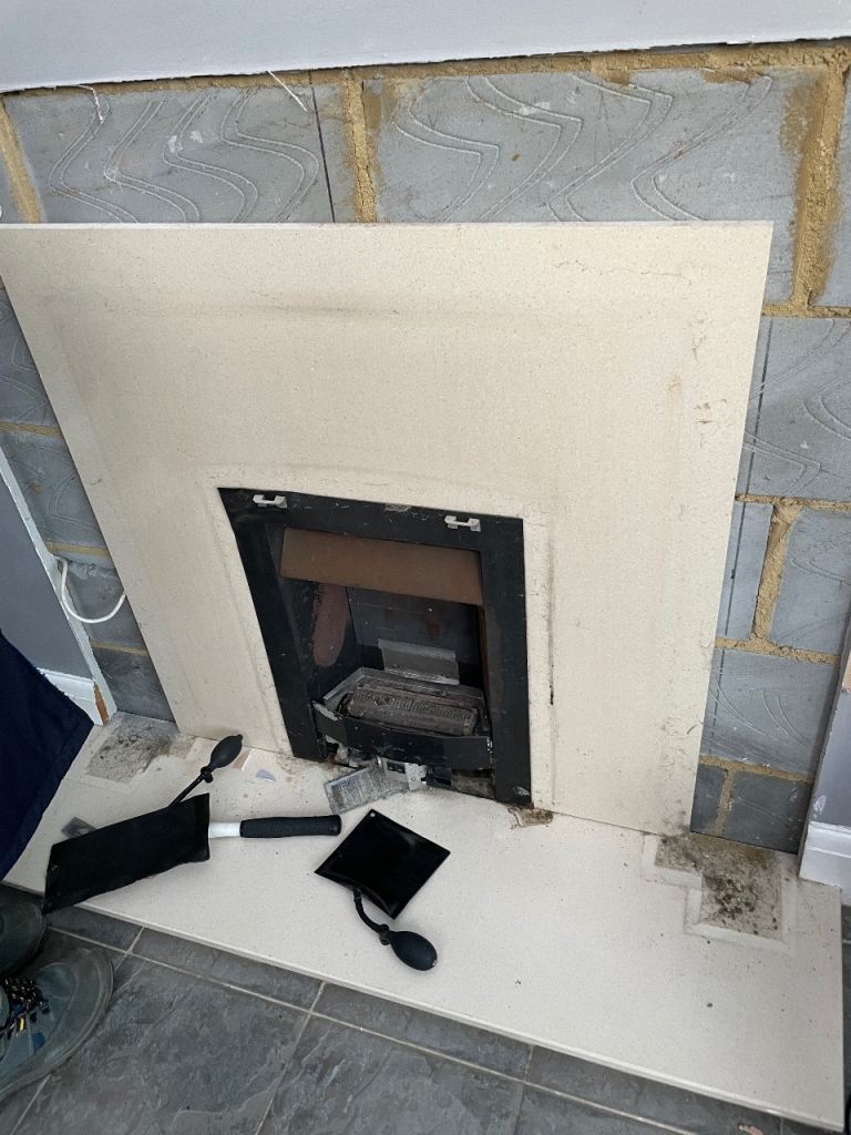 Cream marble fire surround and hearth